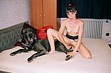 Sexy girl fucking her dog
