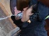 Girl drink warm horse cum